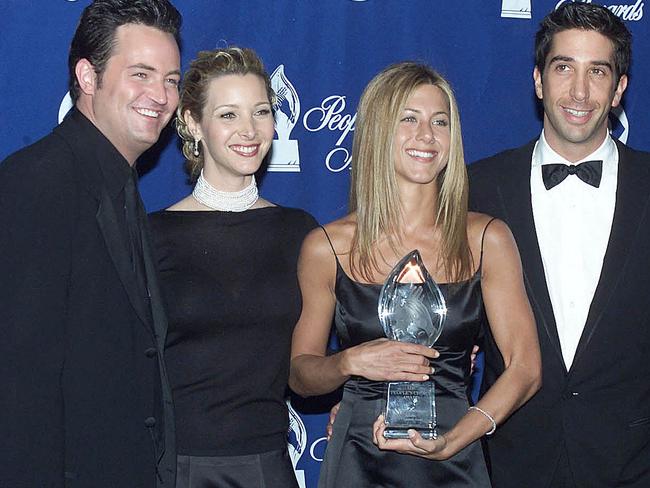 Perry (left) with Friends co-stars Lisa Kudrow, Jennifer Aniston, and David Schwimmer at the 26th People's Choice Awards in 2000. Picture: Lucy Nicholson/AFP