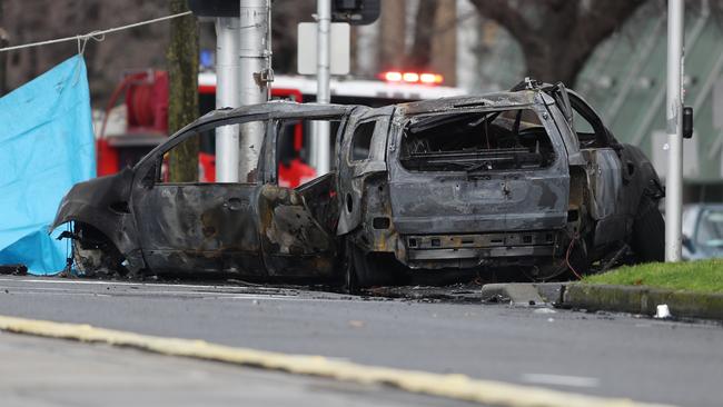 Two burnt out cars after the crash near The Royal Women’s Hospital. Picture: David Crosling