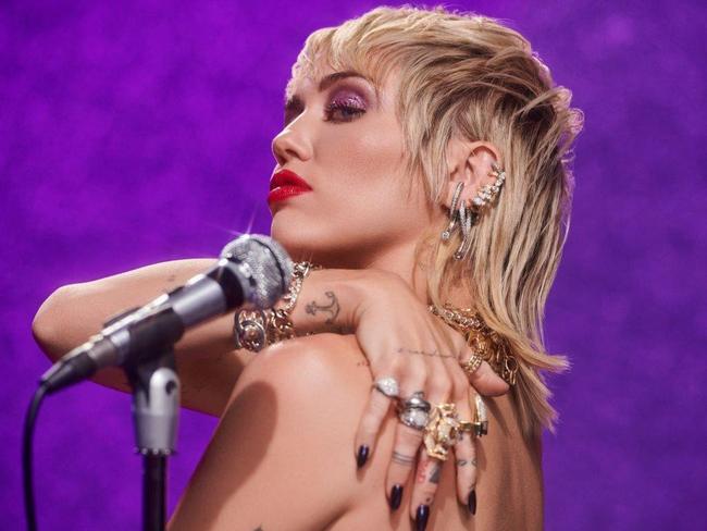 Miley Cyrus has opened up about her trademark mullet hair cut.