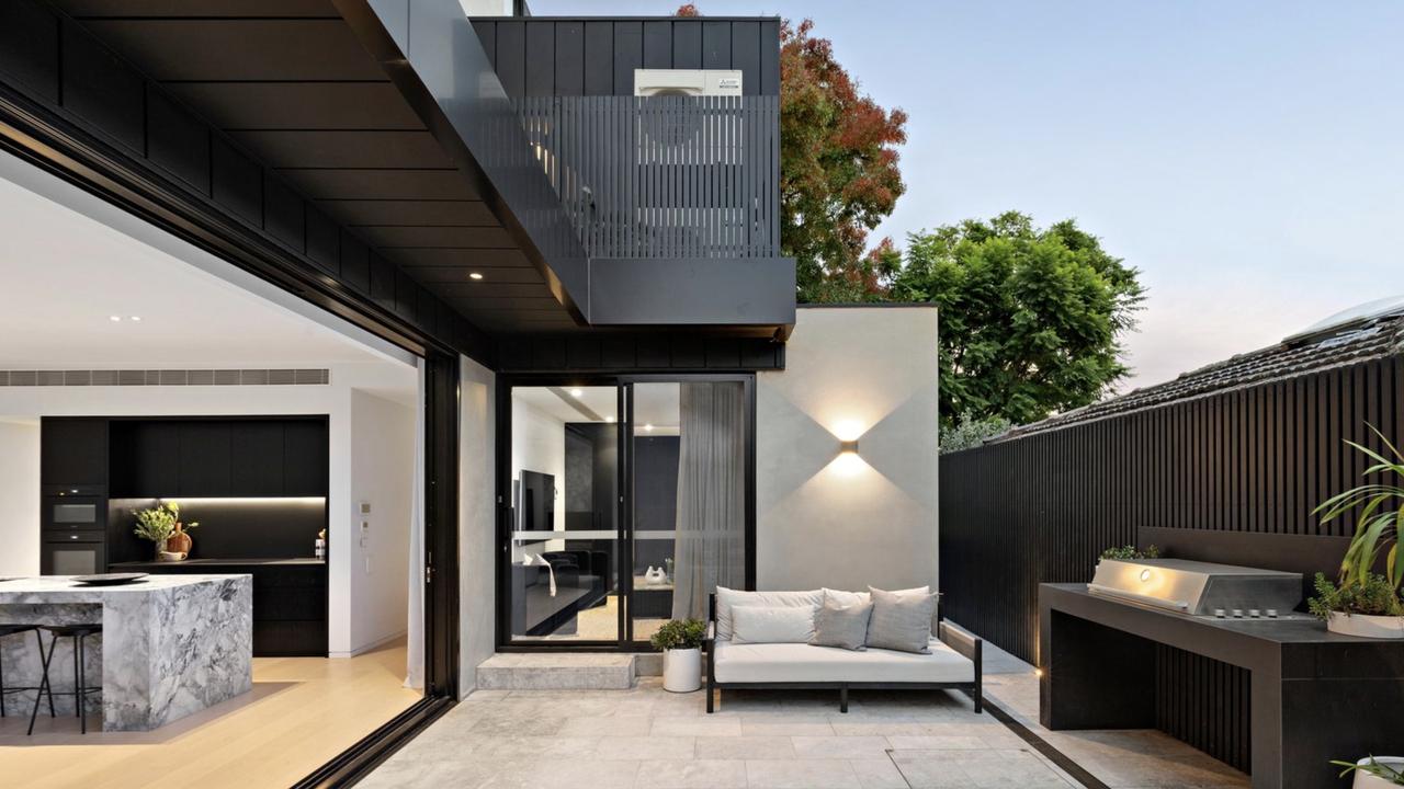 Alan Didak’s Kew townhouse, featuring a speak-easy-style bar and heated pool, remains on the market after passing in at auction with a $3.6m-$3.95m guide.