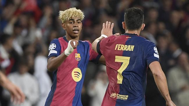 The teen sensation still found a way to score. (Photo by Josep LAGO / AFP)