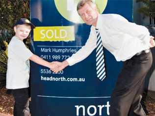 LACHLAN Shields wants to be a real estate agent, just like Mark Humphries, principal of North Estate Agents in Tweed Heads. Picture: Tweed Daily News