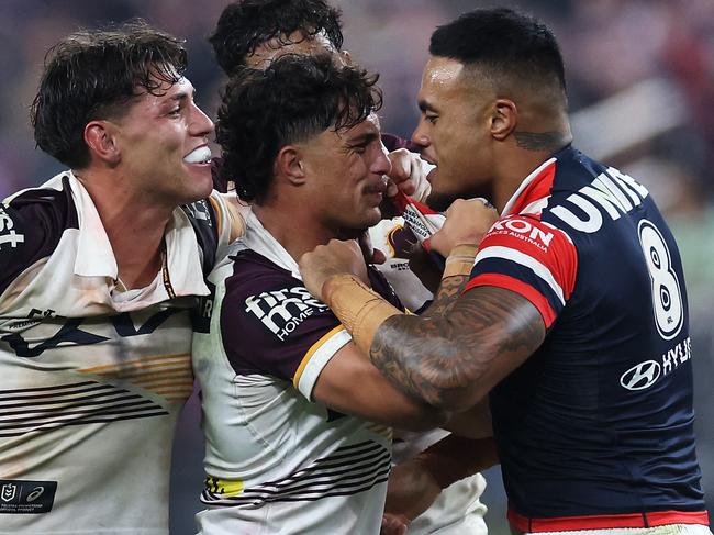 LAS VEGAS, NEVADA - MARCH 02: SpencerÂ Leniu (r) of the Roosters exchanges heated words with KotoniÂ Staggs of the Broncos during the round one NRL match between Sydney Roosters and Brisbane Broncos at Allegiant Stadium, on March 02, 2024, in Las Vegas, Nevada.   Ezra Shaw/Getty Images/AFP (Photo by EZRA SHAW / GETTY IMAGES NORTH AMERICA / Getty Images via AFP)