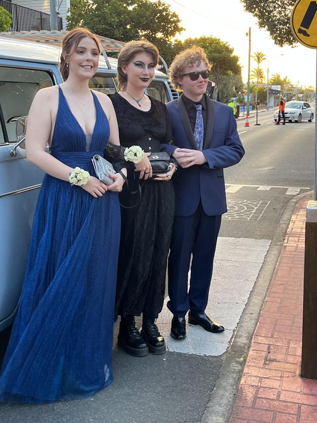 Jessica Bovey, Tabitha Kearnes and Mitchell Gordon arrive at the formal in a Kombi.