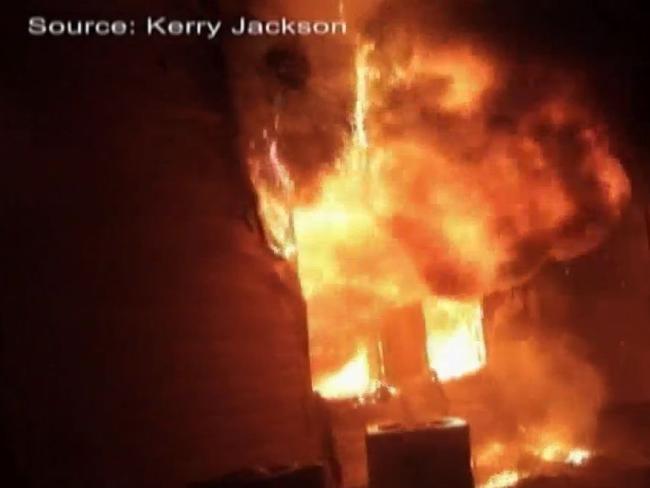 Engulfed ... the fire ignited in an upstairs room before quickly spreading to the downstairs apartment. Picture: Kerry Jackson