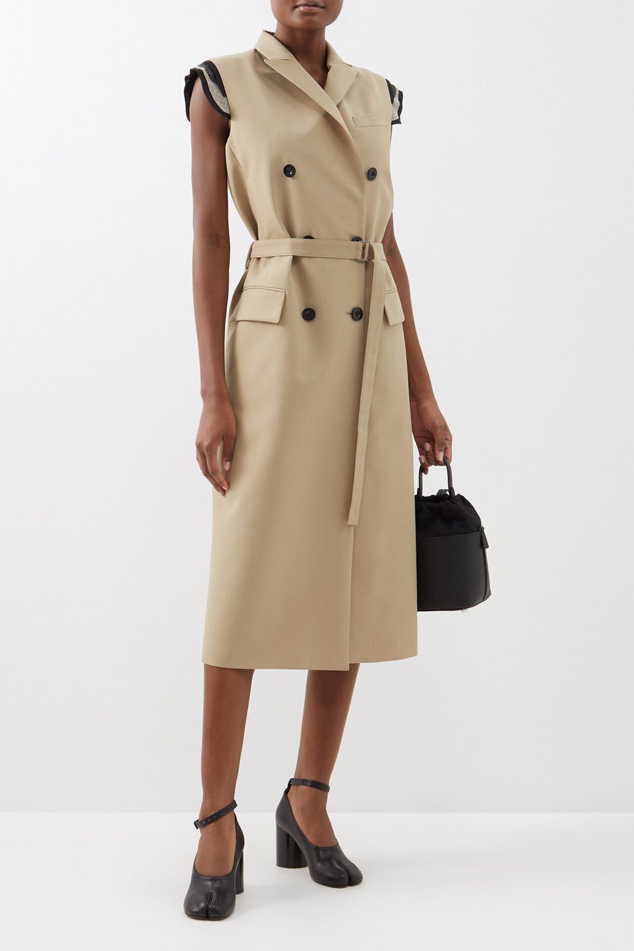 <p><strong>SHOP NOW:&nbsp;</strong>Sacai sleeveless double-breasted trench coat, $970 (originally $1,940) from <strong><a href="https://www.matchesfashion.com/au/products/1513669" target="_blank" rel="nofollow noopener">Matches Fashion</a></strong></p>