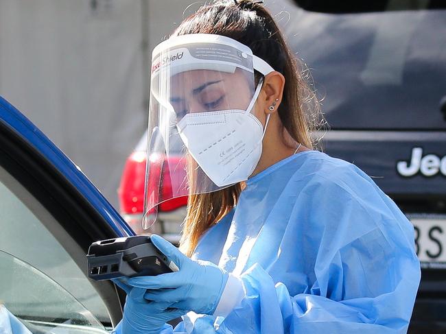 SYDNEY, AUSTRALIA - NewsWire Photos, JANUARY 24 2022: Health Professionals are seen working at the Haberfield Covid testing site in the inner West in Sydney. Picture: NCA NewsWire /Gaye Gerard