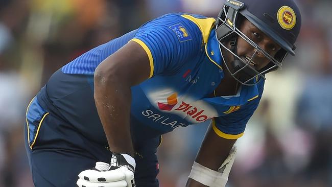 Sri Lankan captain Angelo Mathews after copping a blow to the leg.