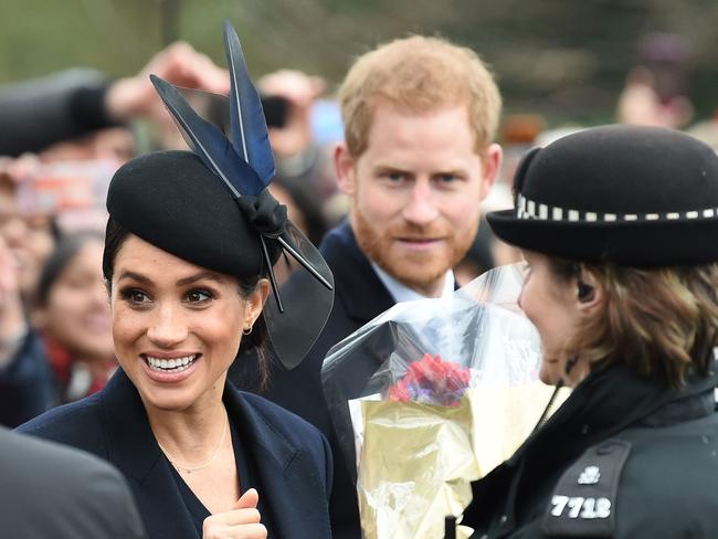 Meghan attends the royal family’s traditional Christmas Day service with Prince Harry. Picture: AFP 