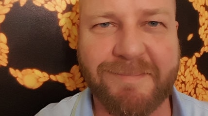 University of Adelaide scientist Simon Dillon, who is accused of using the internet to attempt to groom children under the age of five for sex.