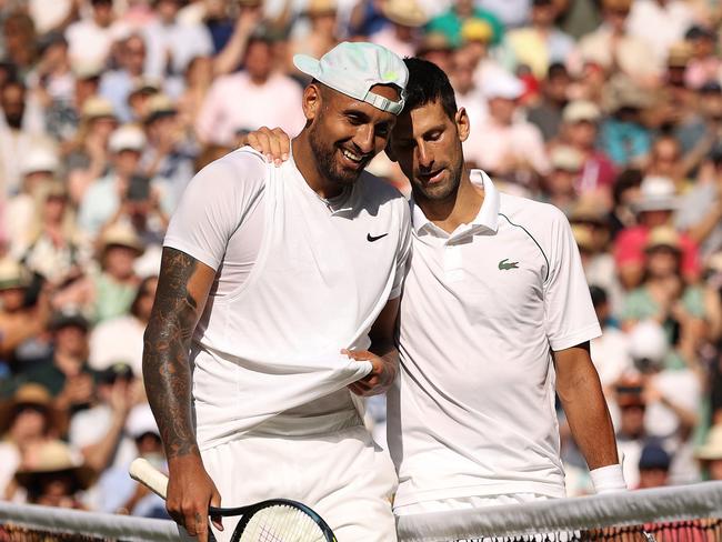 LONDON, ENGLAND - JULY 10: Winner Novak Djokovic of Serbia (L) and runner up Nick Kyrgios of Australia interact by the net following their Men's Singles Final match day fourteen of The Championships Wimbledon 2022 at All England Lawn Tennis and Croquet Club on July 10, 2022 in London, England. (Photo by Ryan Pierse/Getty Images)