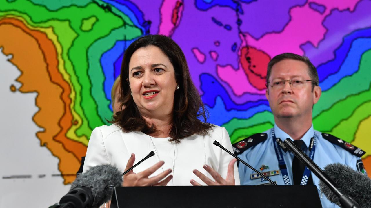 Queensland Premier Annastacia Palaszczuk and Deputy Police Commissioner Bob Gee address the media after a meeting of the State Disaster Management Committee at the Emergency Services Complex in Brisbane, Friday, February 1, 2019 to discus the flooding situation in Townsville. (AAP Image/Darren England)