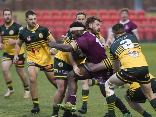 Dalby player Tomasi Naborisi bursts through the Wattles defence. Picture: Kevin Farmer.