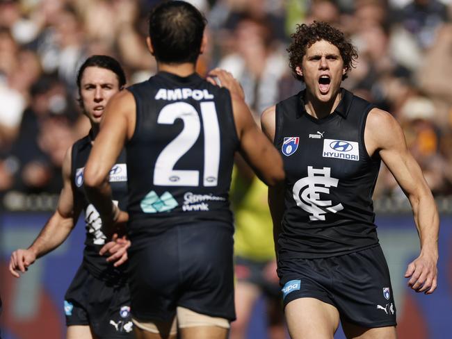 MELBOURNE, AUSTRALIA - AUGUST 11: Charlie Curnow of the Blues celebrates kicking a goal during the round 22 AFL match between Carlton Blues and Hawthorn Hawks at Melbourne Cricket Ground, on August 11, 2024, in Melbourne, Australia. (Photo by Daniel Pockett/Getty Images)