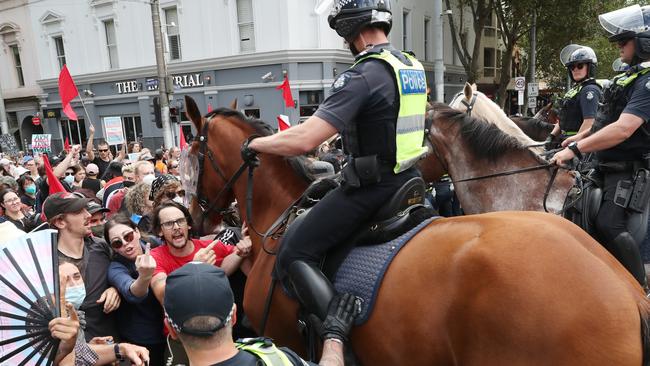 Protest groups faced off in front of the Victorian parliament. Picture: NCA NewsWire / David Crosling