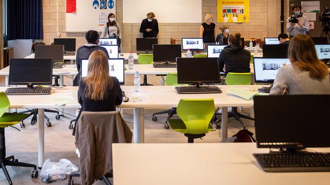 Socially distanced students sit an exam to get access to medicine faculties in Flemish universities in Dilbeek, Belgium. Picture: AFP