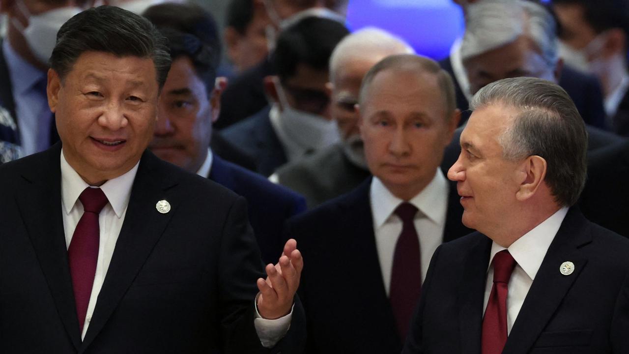 China's President Xi Jinping, Russian President Vladimir Putin, Uzbek President Shavkat Mirziyoyev and other participants attend the Shanghai Cooperation Organisation. Picture: Sergei BOBYLYOV / SPUTNIK / AFP.