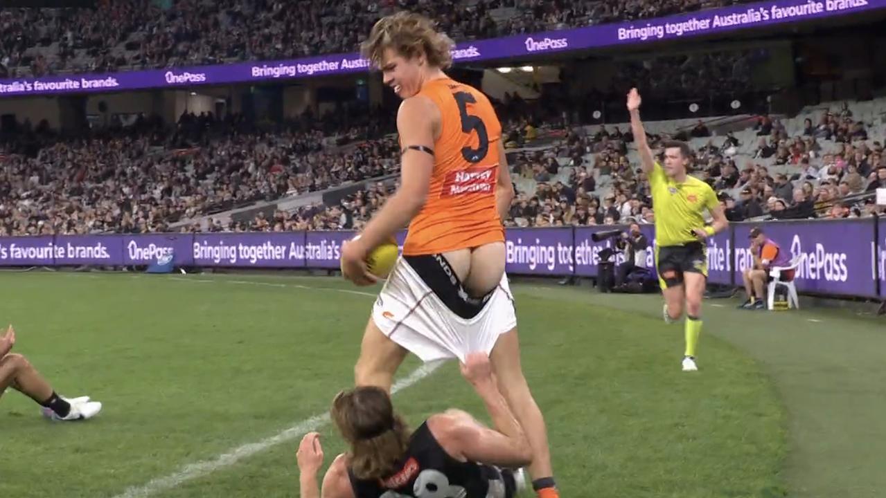 Nathan Murphy pulls down the shorts of the Giants' Aaron Cadman.