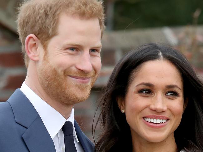 LONDON, ENGLAND - NOVEMBER 27:  Prince Harry and actress Meghan Markle during an official photocall to announce their engagement at The Sunken Gardens at Kensington Palace on November 27, 2017 in London, England.  Prince Harry and Meghan Markle have been a couple officially since November 2016 and are due to marry in Spring 2018.  (Photo by Chris Jackson/Chris Jackson/Getty Images)