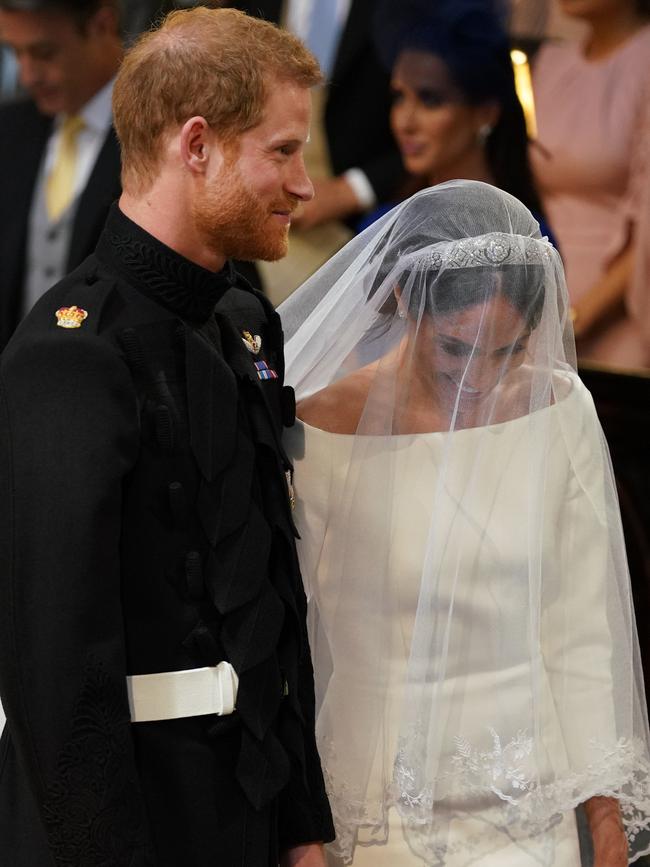 A casual laugh at the altar. Picture: Getty Images