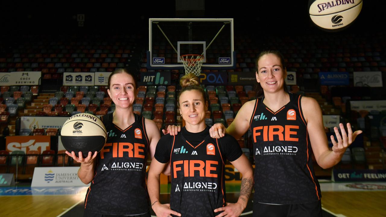 Townsville Fire co-captains Courtney Woods, Lauren Mansfield and Alicia Froling and their teammates are fired up for the semi-final game against Perth Lynx at the Fire Pit. Picture: Evan Morgan