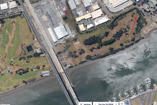 The duplicate Gateway bridge under construction in 2009, with the old holes on the RQGC's eastern section still visible (right). Picture: Nearmap