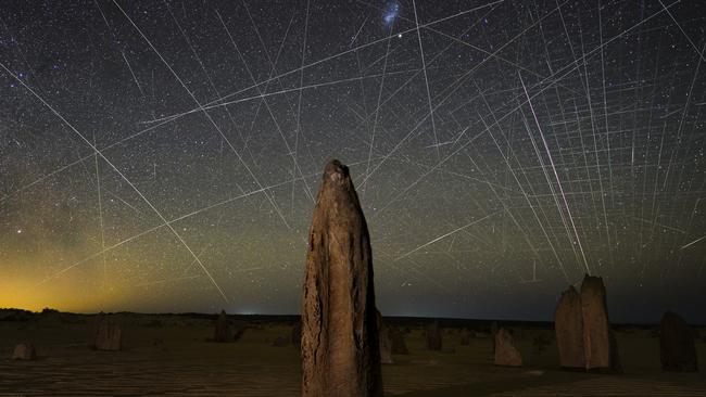 Wow: satellite light trails, photographed at the Pinnacles. Picture: Joshua Rozells