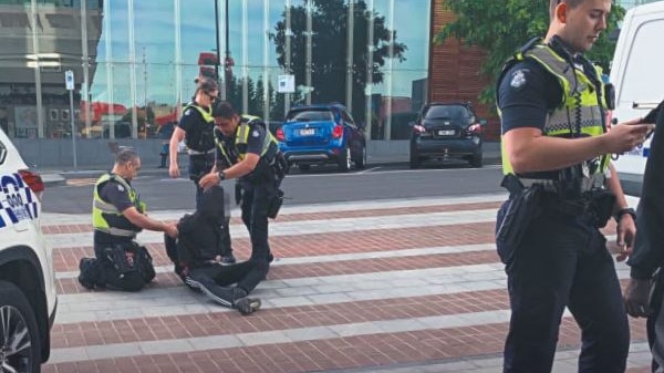 Police apprehend a man in Dandenong as crime surges in the municipality’s once popular shopping hub.