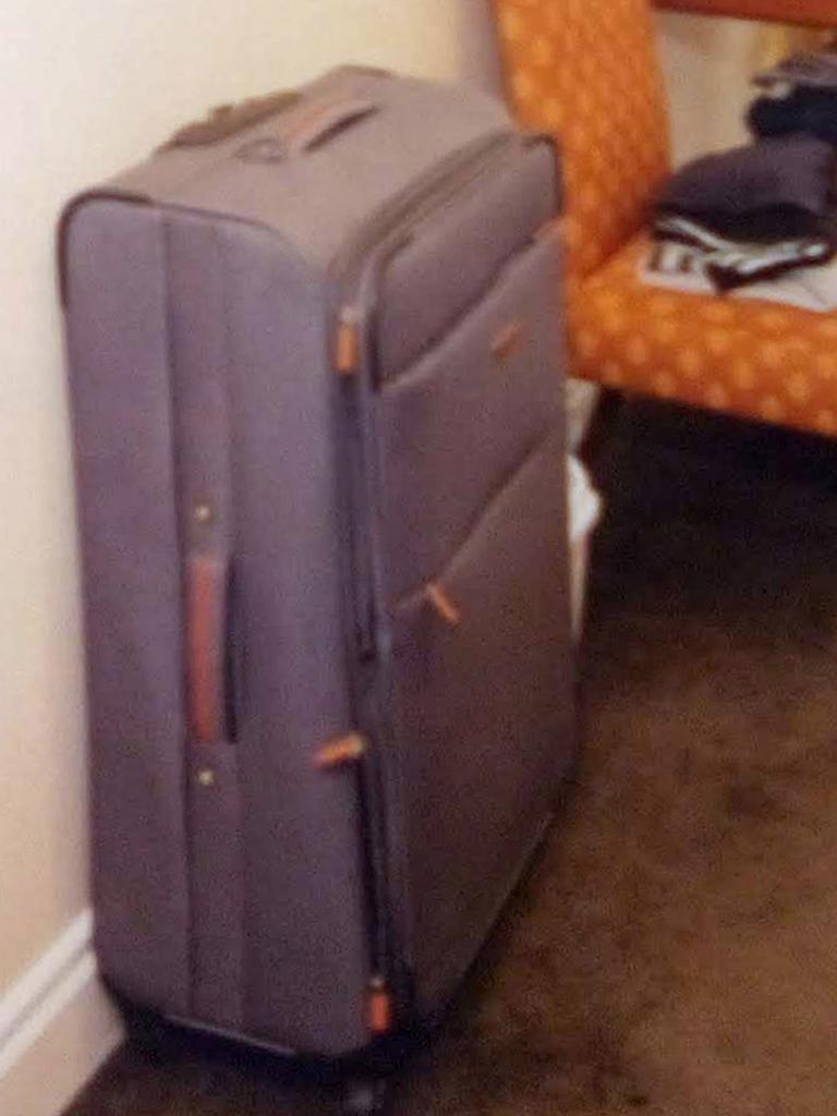 A suitcase found in the apartment. Picture: Auckland City Police/PA Wire