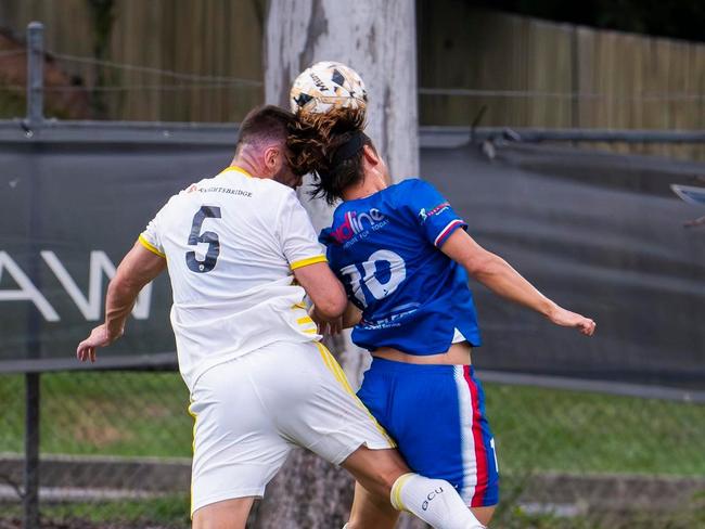 Darryl Bright (left) and Ken Akamatsu (right) competing for a header Credit: Peninsula Power