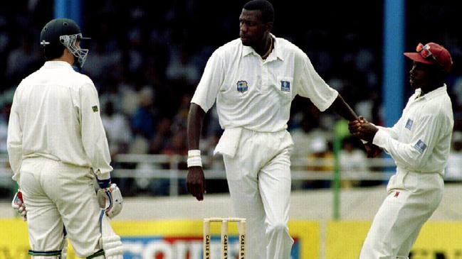 West Indies captain Richie Richardson pulls Curtly Ambrose away from Steve Waugh after things for heated in Port of Spain.