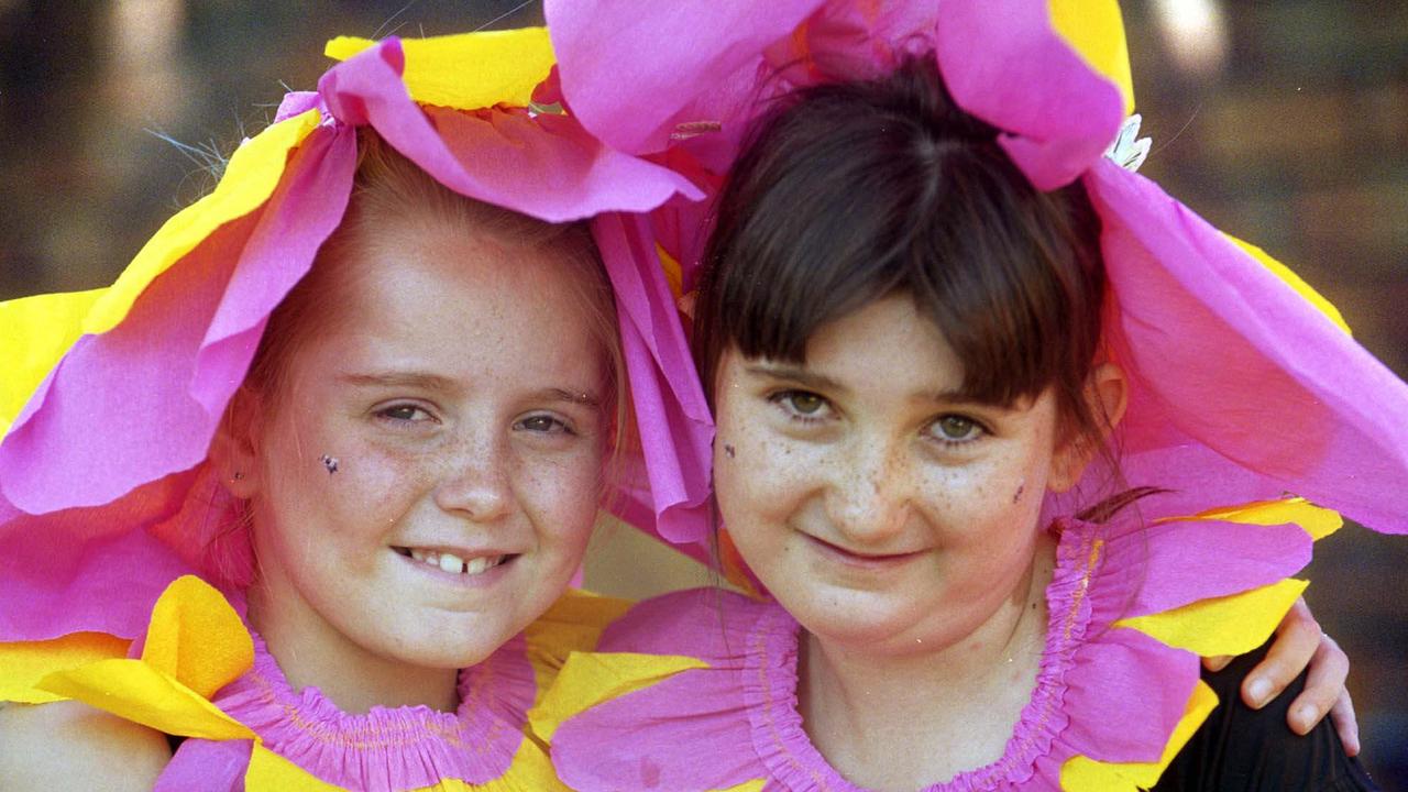 These two flower petals Iris Mill, 8, and Sno Bannister, 7, awaiting the start of the 51st Annual Toowoomba Carnival of Flowers Parade. Pic: David Martinelli.