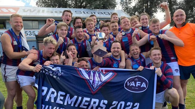 PEGS reserves celebrate their VAFA Division one flag. (Picture: Supplied)