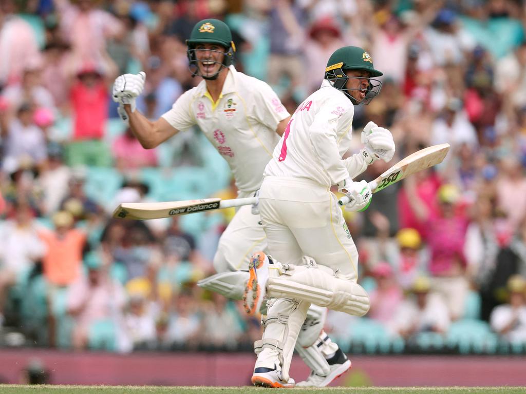 Cummins was in the middle with Khawaja when he scored his first innings century at the SCG in 2022. Picture: David Gray/AFP