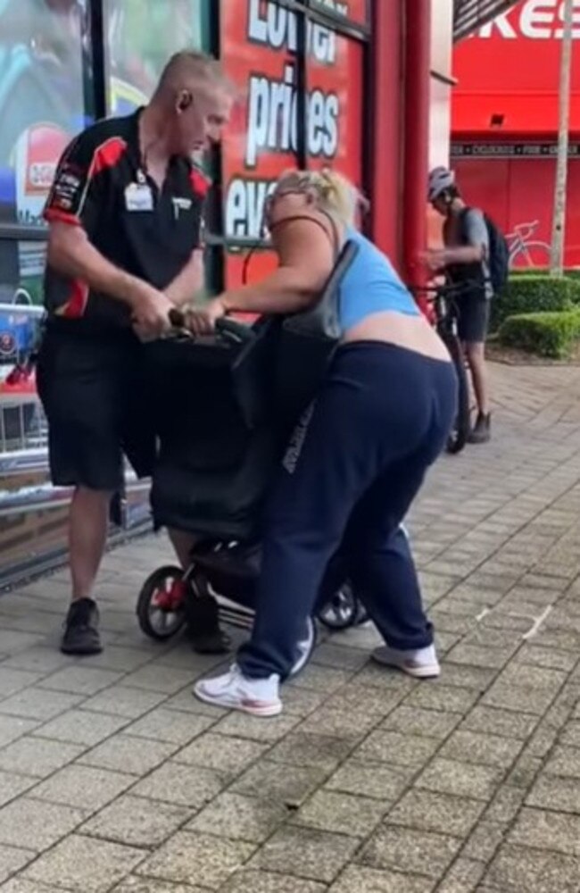 The employee and woman where seen fighting over the pram. Picture: Facebook.