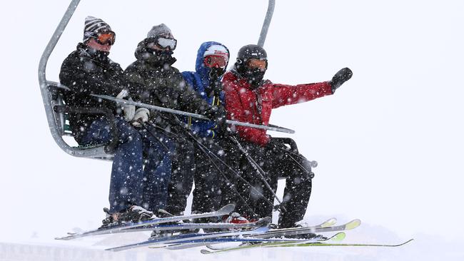 26/07/15 Sydney, NSWPhoto: Andrew MurrayUnidentified people on a ski lift at Perisher.