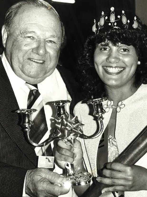 Member for Callide Lindsay Hartwig presents Pineapple Queen Debra Wilkinson with a crown during his time as a Queensland MP.