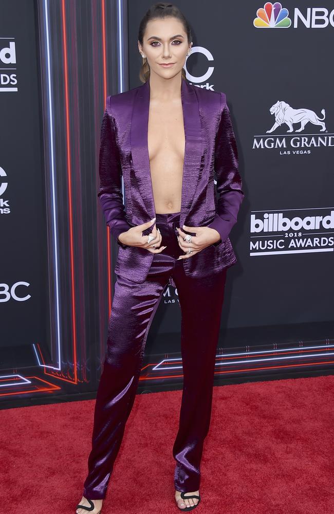 Keep holding that jacket in place like your life depends on it, Alyson Stoner. Picture: AP