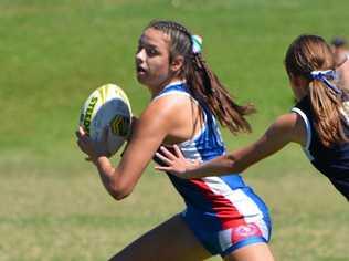 FAST MOVER: Darling Downs touch footballer Georgia Bartlett attempts to evade her opponent during a match at the Queensland School Sport Touch Football State Championships. Picture: Contributed