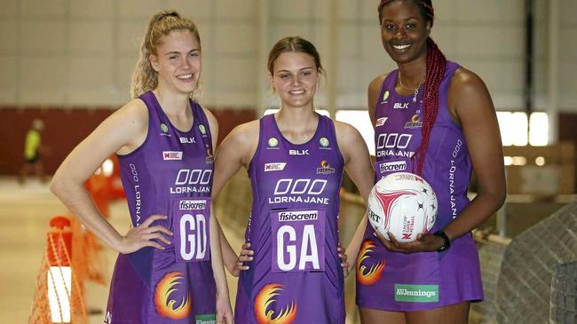 Queensland Firebirds netball players Kim Jenner (left), Tippah Dwan and Romelda Aiken during a tour of the new netball facility under construction in Brisbane. Picture: REGI VARGHESE