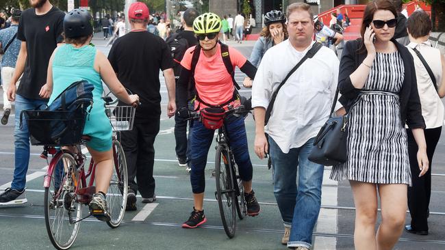 Pedestrians play lottery with their safety during peak times as cyclists zoom along Southbank Promenade. 