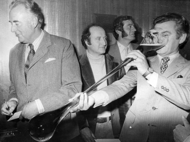 Bob Hawke, with Prime Minister Gough Whitlam, drinks a yard of ale at the official opening of the Bob Hawke Hotel in 1974. Despite his parliamentary ambitions, he enjoyed a freedom as ACTU president which would not occur to the same extent if he was an opposition MP.