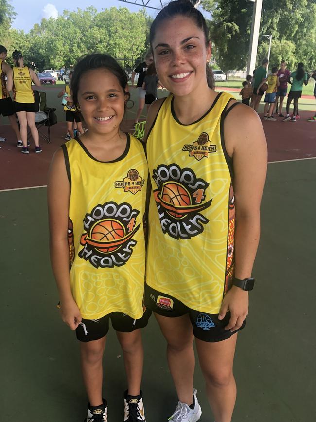 Jodicee Duggan with Canberra Capitals player and Darwin product Abby Cubillo. Picture: Hoops 4 Health