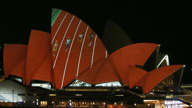 The Sydney Opera House showing Cathy Freeman running down the back straight. Picture: Lisa Maree Williams/Getty Images