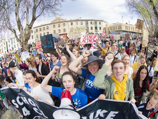 Bryher Mckewin (with mic) , Amelie Hudspeth and Toby Thorpe. Climate strike rally in Hobart. Picture: RICHARD JUPE
