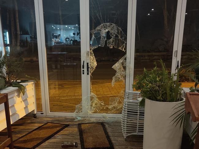 Thieves and vandals have smashed in the the storefronts of multiple businesses across Hervey Bay. The scene at Banksia Bar and Grill.