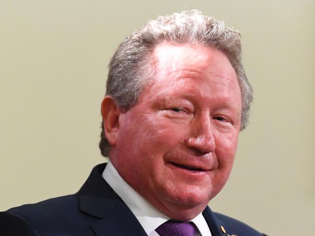 Businessman Andrew Forrest (right) of the Minderoo Foundation addresses the media at the Commonwealth Parliamentary Offices in Melbourne, Wednesday, April 29, 2020. Australia has secured an extra 10 million COVID-19 test kits and pathology equipment through a partnership between the federal government, businessman Andrew Forrest's Minderoo Foundation and private Pathology providers. (AAP Image/James Ross) NO ARCHIVING