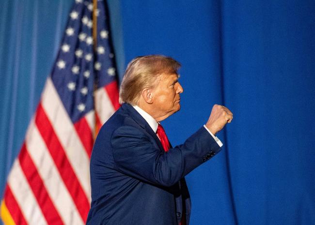 Former US President and 2024 Republican presidential hopeful Donald Trump leaves after speaking during a campaign rally at the University of New Hampshire's Whittemore Center Arena in Durham, New Hampshire, on December 16, 2023