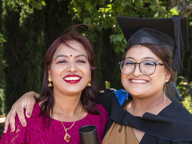 Graduate Sushila Duwal with mum Subhadra Duwal visiting from Nepal at a UniSQ graduation ceremony at Empire Theatres, Tuesday, October 31, 2023. Picture: Kevin Farmer