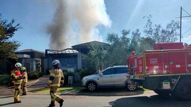 Emergency services were called to a house fire in Pakenham, finding the garage ablaze. Image: Shelby Brooks.